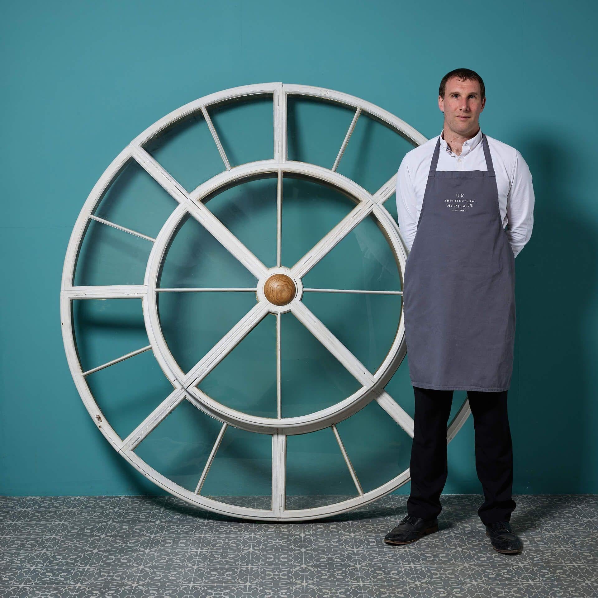 A reclaimed circular domed cupola window from the White Star Lines famous Atlantic liner RMS Olympic, sister ship to the iconic Titanic.

At 6ft diameter the outside is a bright white and the inside a timeless gold, both with characterful timeworn