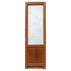 Recycelte Tür aus Altholz mit geätztem Glas