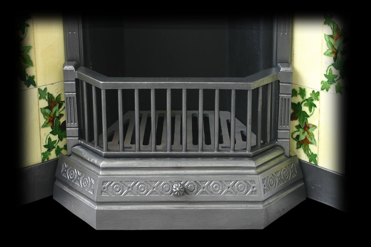 Reclaimed Edwardian cast iron fireplace insert with geometric pattern to the frame and ash tidy. Complete with a set of original Edwardian fireplace tiles. 

Finished with traditional black grate polish and ready for a solid fuel fire, complete
