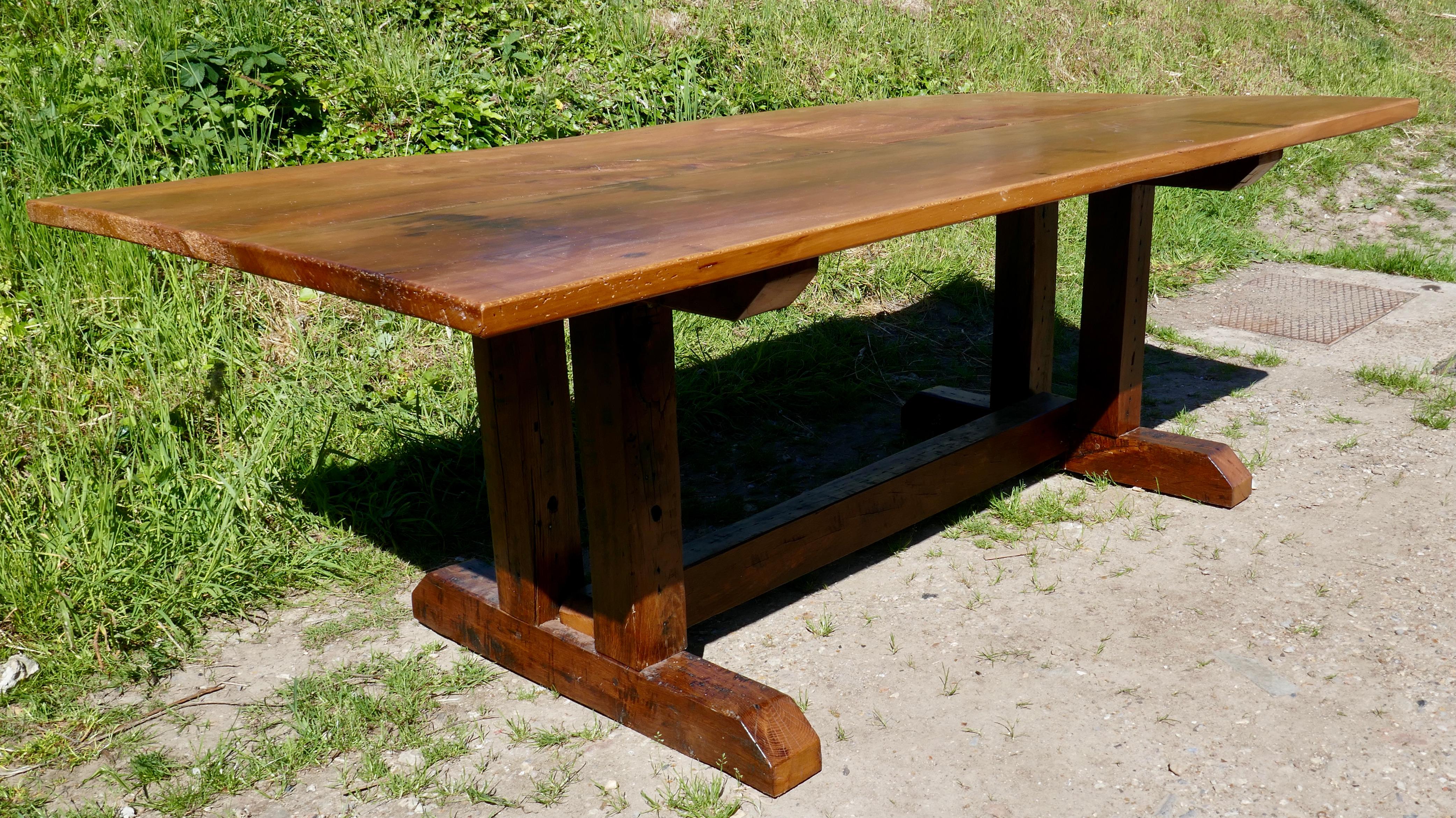 Reclaimed Elm Rustic English Barn Table  

This is a superb piece, the table top is thick and made from 2 heavy planks of solid Elm, the wood has a rustic appearance with natural gnarling and termite holes, it has a large inset patch on one of the