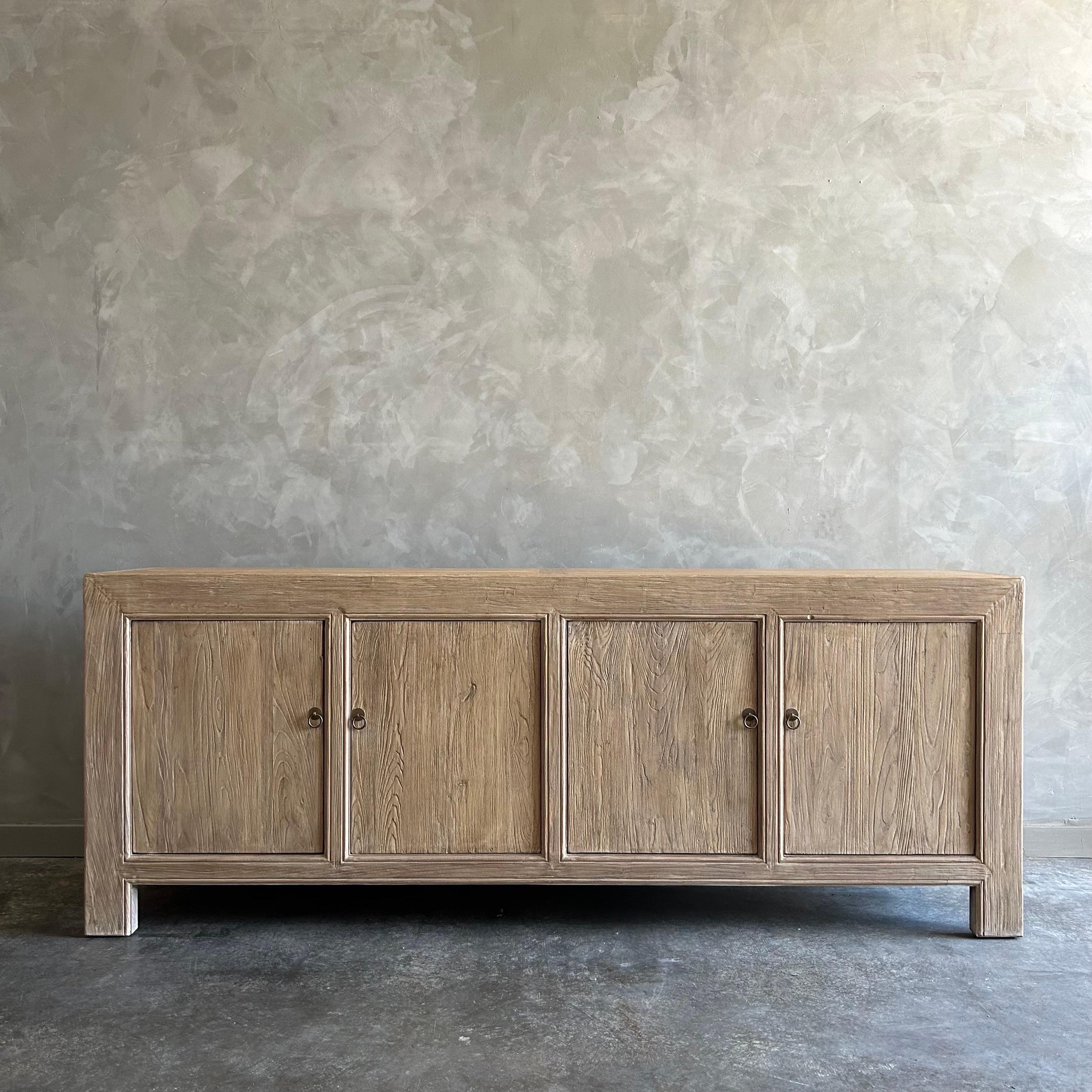 Reclaimed elm wood 4 door cabinet. 
These old elm timbers show in its most primal, natural form. The artisanal construction methods highlight the elm woods beautiful grain pattern & knots and fissures from its past life. The most authentic materials
