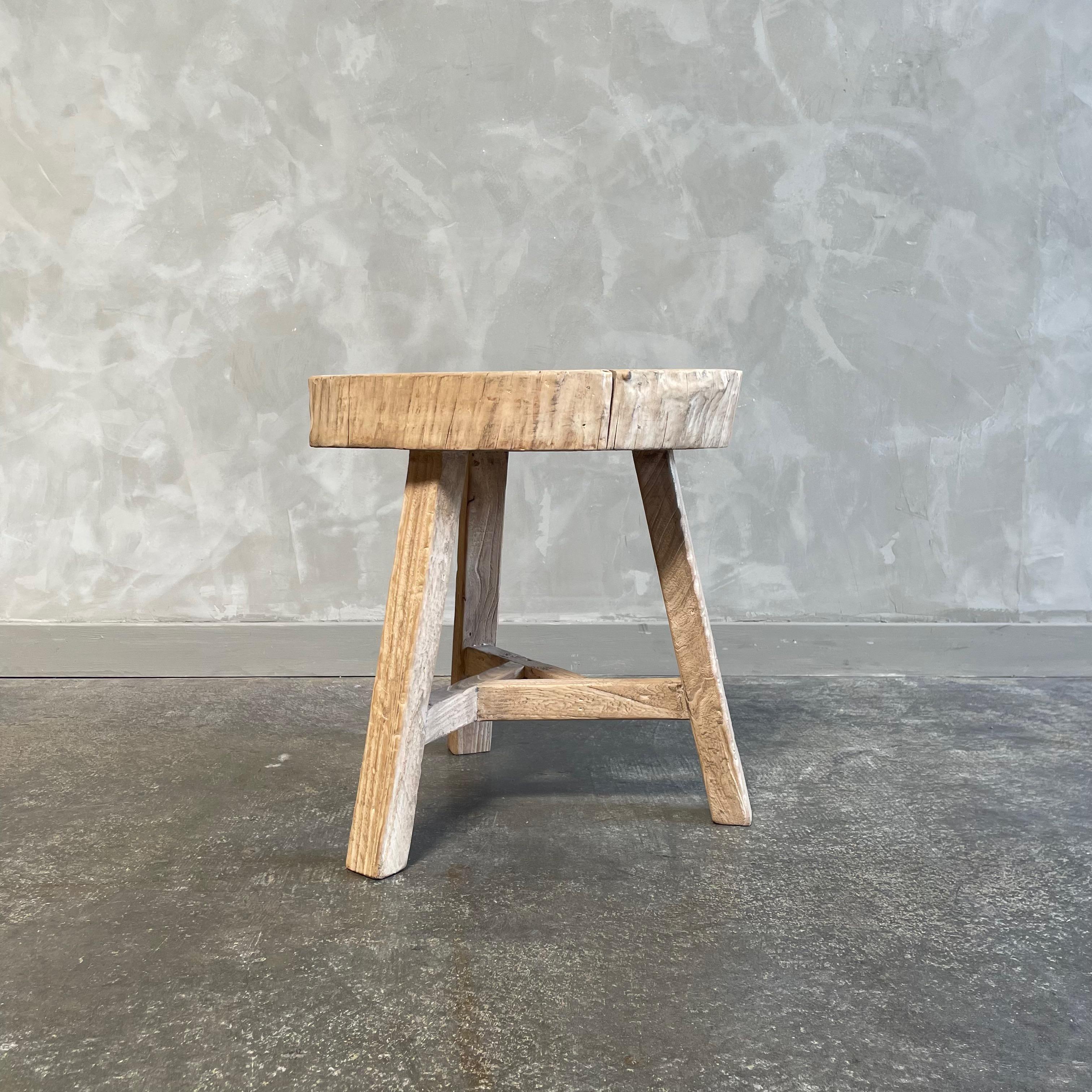This solid stump slice was turned into a side table or stool. The solid thick top has a beautiful movement with unique characteristics. A natural live edge to show shape and form of what was. Solid and sturdy, perfect earthy organic piece to add to