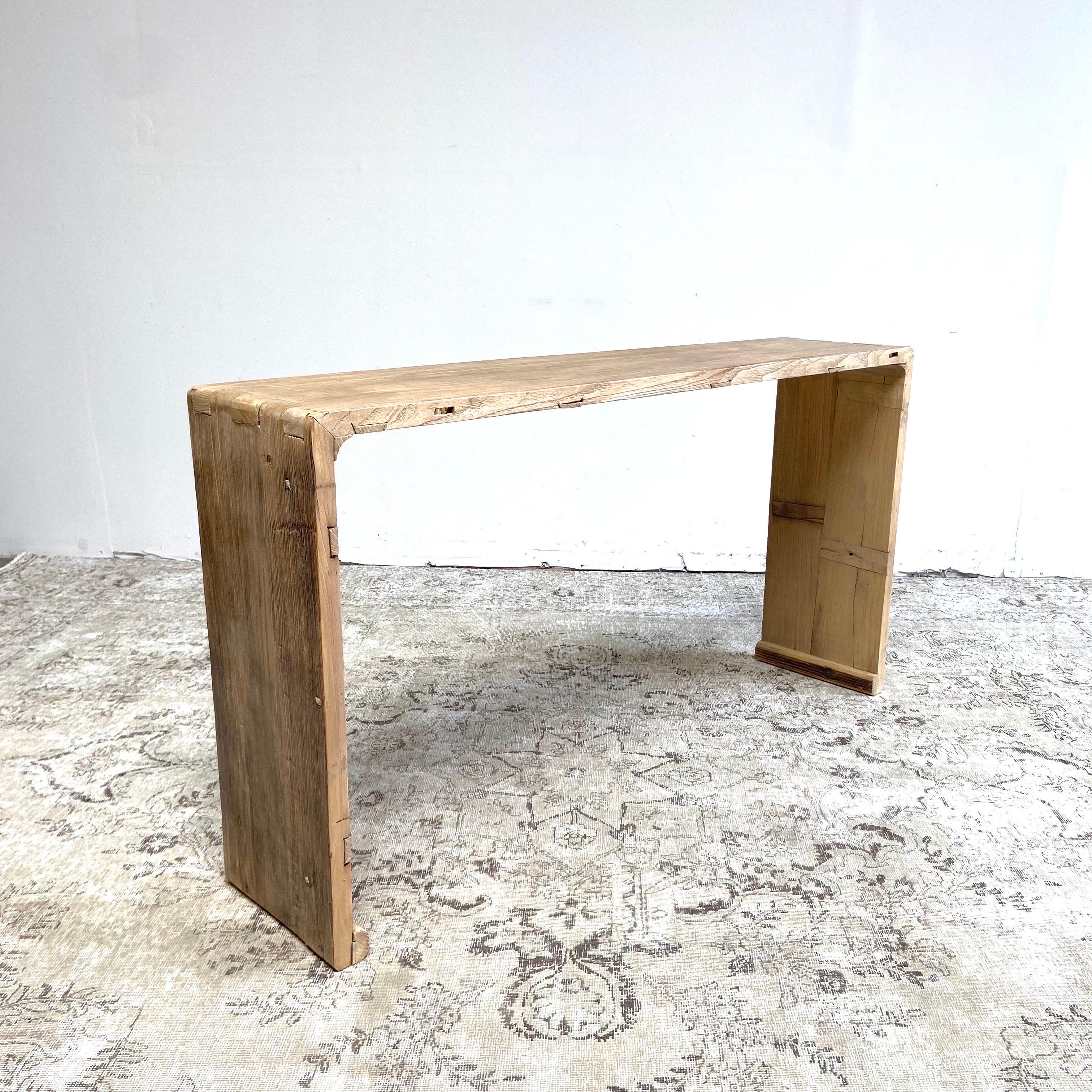 Reclaimed from Vintage timbers, this elm wood console table features original notches from the door hinges on the inside of the legs.
Made from Vintage reclaimed elm wood. Beautiful antique patina, with weathering and age, these are solid and