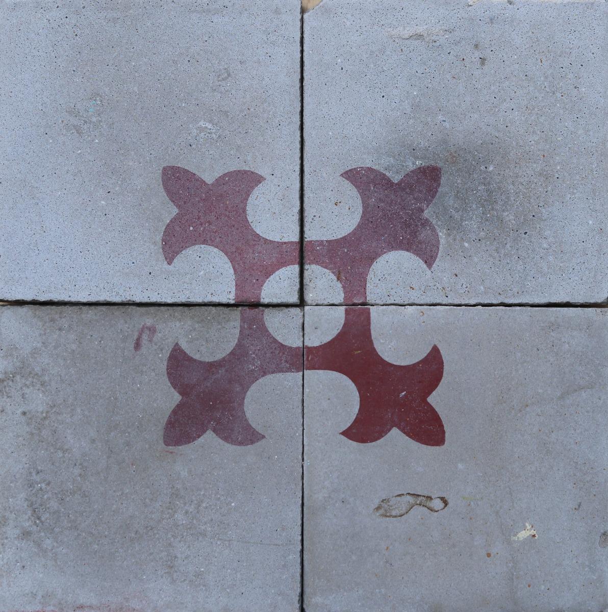 A set of 28 reclaimed encaustic cement tiles. These tiles will cover 1.12 m2 or 12 sq ft. 7 sets of 4 tiles.