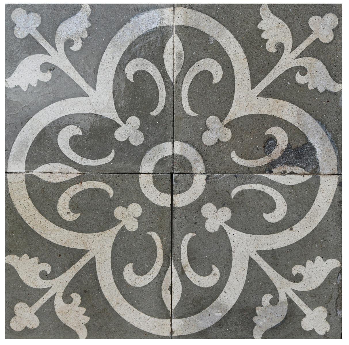 A set of 141 reclaimed encaustic cement tiles. These tiles will cover 5.64 m2 (60 sq ft).