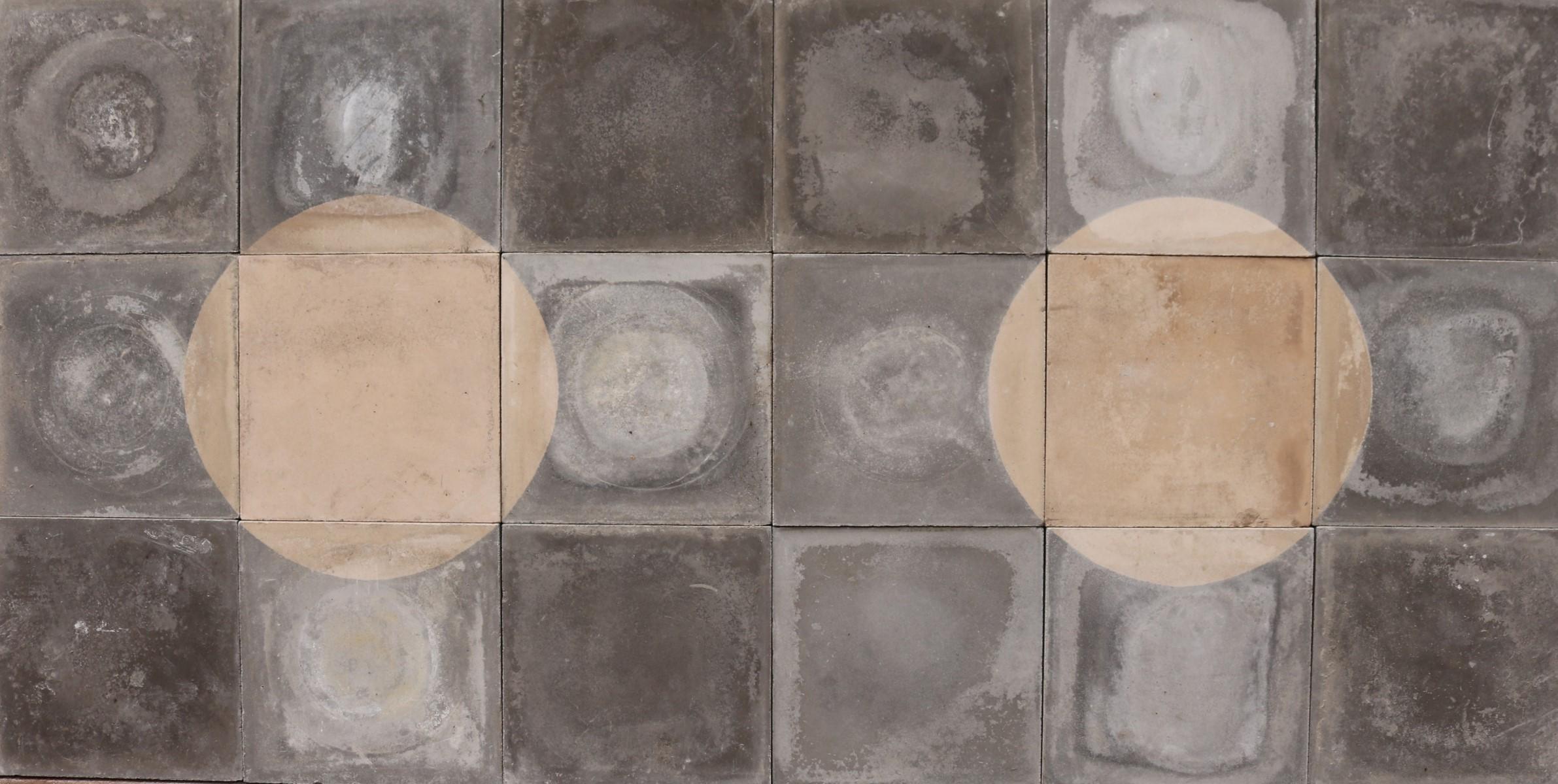 A batch of 147 reclaimed encaustic cement tiles with a black and white circle pattern. These tiles will cover 5.8 m2 or 62 ft2. Suitable for wall or floors.

There are 8 sets in total, two pictured.

Weathered surfaces and small chips associated