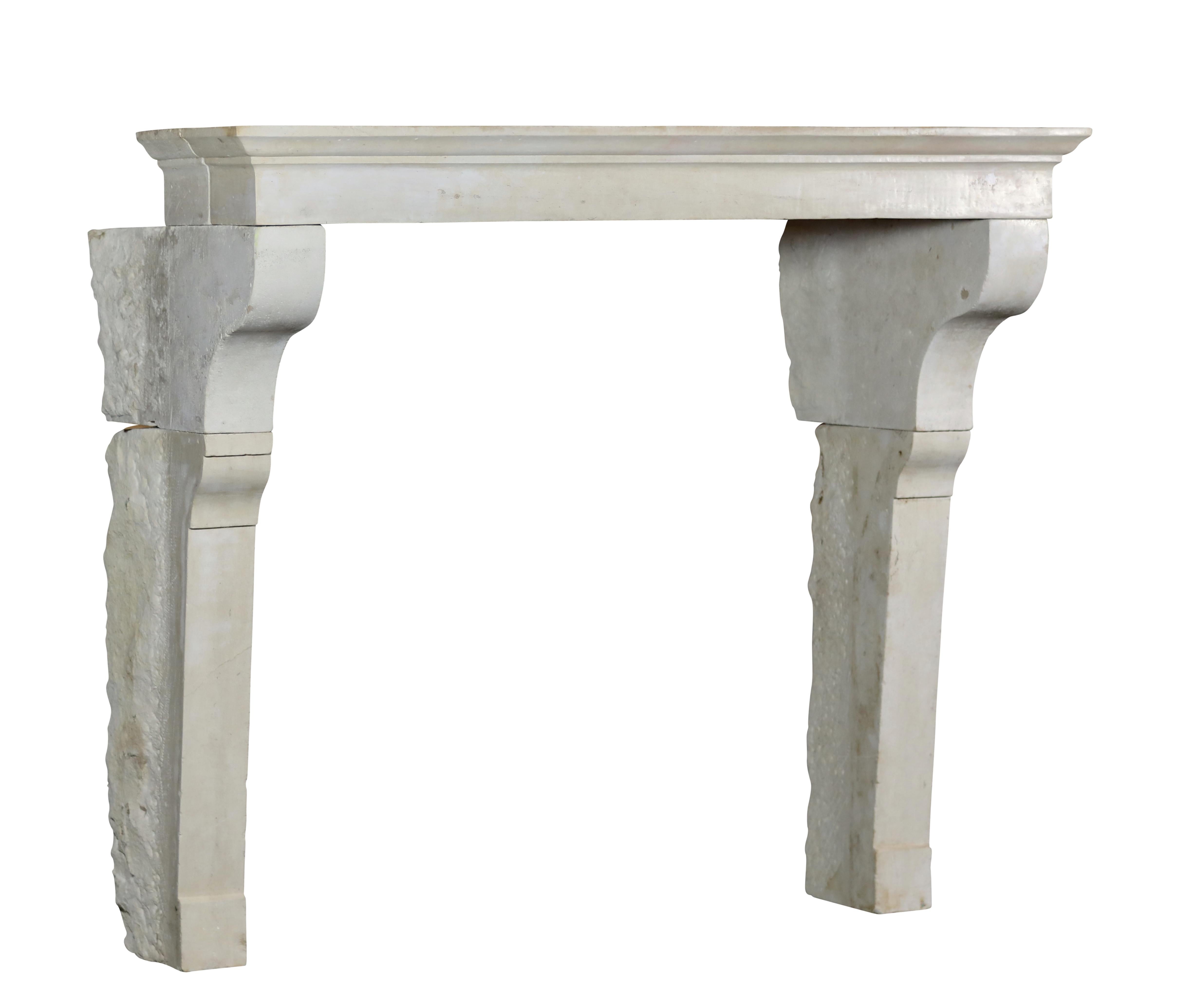 Hand-Carved Reclaimed Fireplace Mantle In Limestone From France For Sale