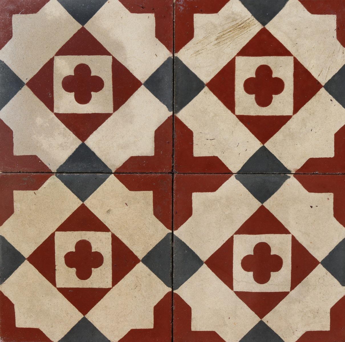 A small batch of 37 reclaimed encaustic cement floor tiles. These tiles will cover 1.48 m2 or 15.9 ft2. They are suitable for use on floors or walls.

Small chips associated with transport and storage. Unused. Good overall condition. Small chips,