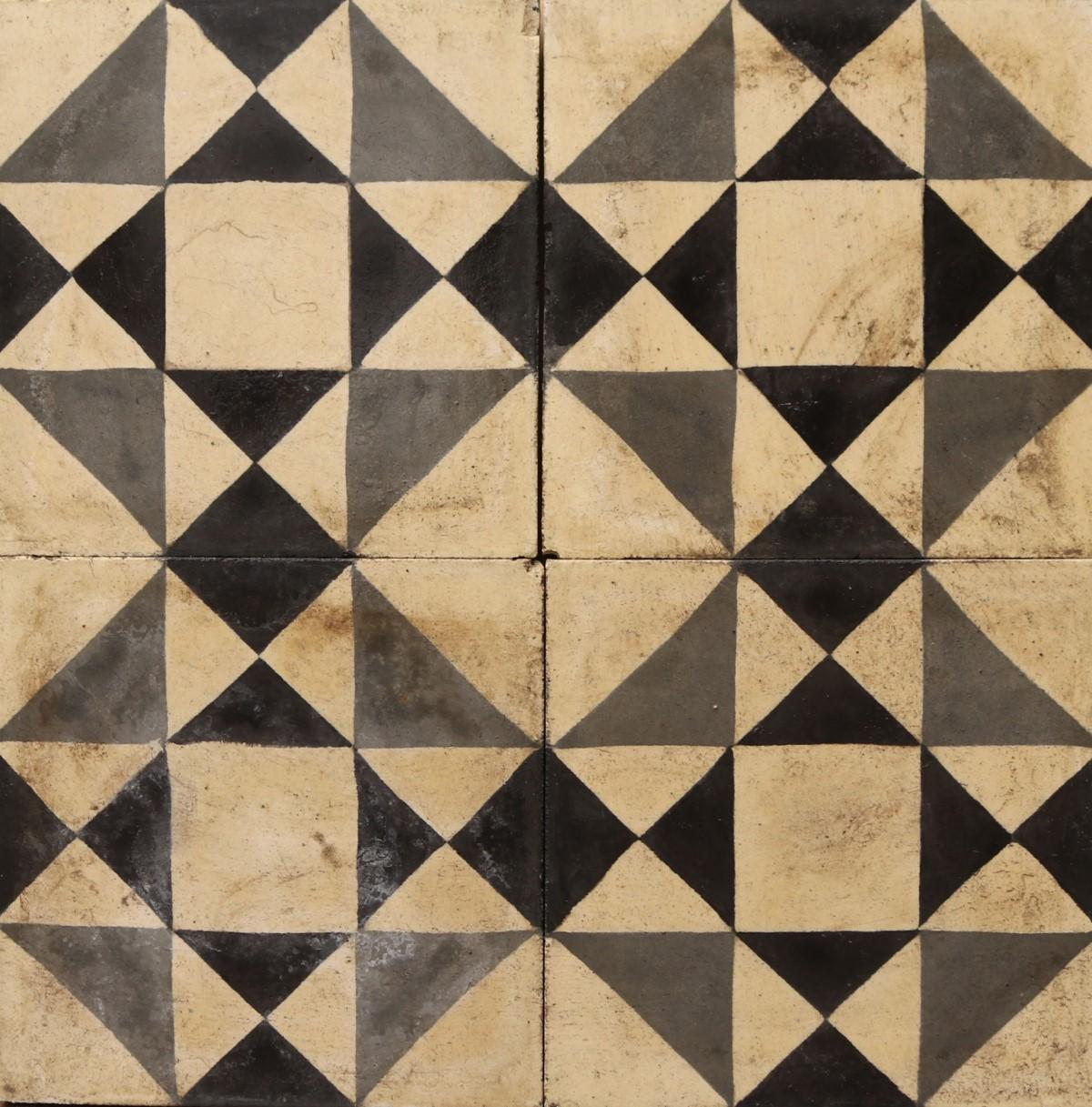 A batch of 42 reclaimed encaustic cement floor or wall tiles with a geometric style pattern. These tiles will cover 1.8 m2 or 19 ft2.

Weathered surfaces and small chips associated with transport and storage. Unused. Good overall condition. Small