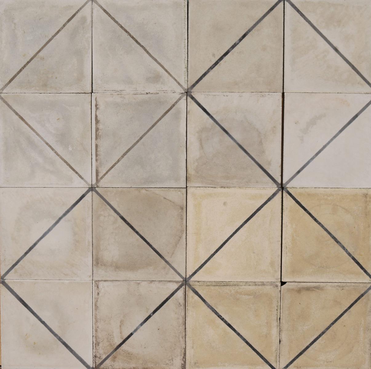 A batch of 76 reclaimed cement patterned floor or wall tiles in three different shades of cream. These tiles will cover 3 m2 or 32 sq ft.

Reclaimed tiles in three shades of cream. Good overall condition. Small chips, losses and surface wear