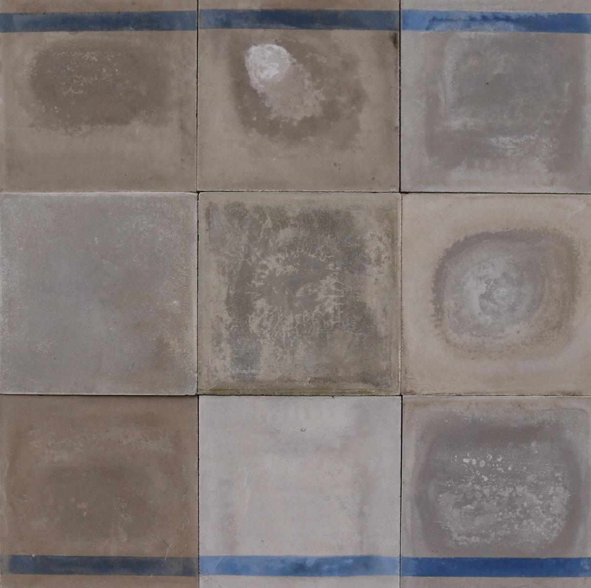 A batch of 128 reclaimed cement floor or wall tiles. These tiles will cover 4 m2 or 43 ft2.

This item consists of:

69 blue line tiles.

35 grey tiles.

Reclaimed tiles in good overall condition. Small chips, losses and surface wear