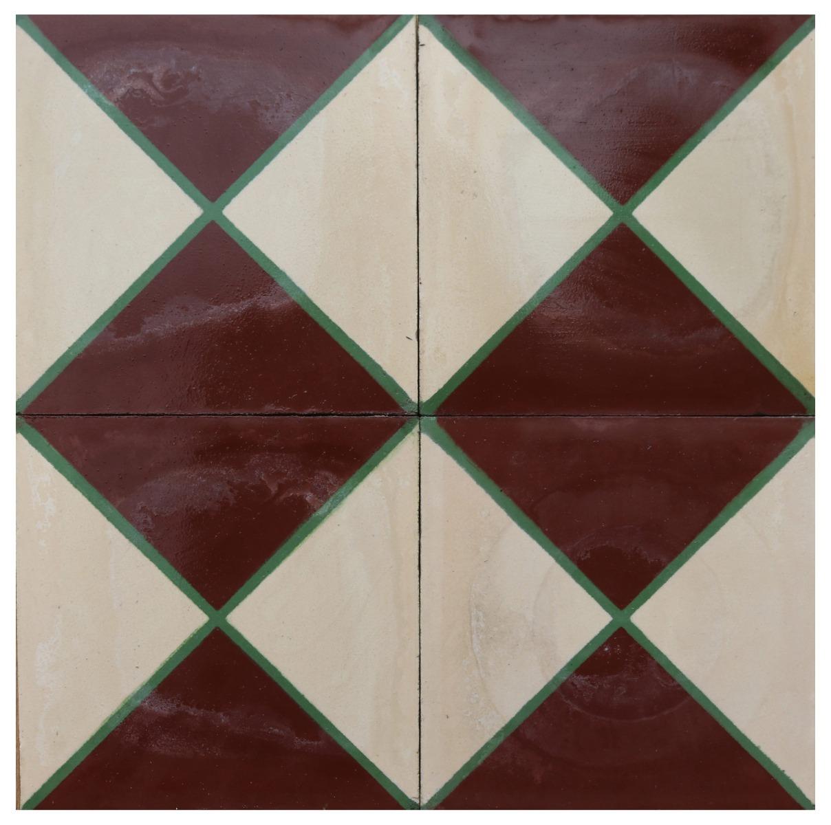 A batch of 121 reclaimed encaustic cement floor tiles. These tiles will cover 4.8 m2 or 52 sq. ft. They are suitable for use on floors or walls.

Small chips associated with transport and storage. Unused. Good overall condition. Small chips,