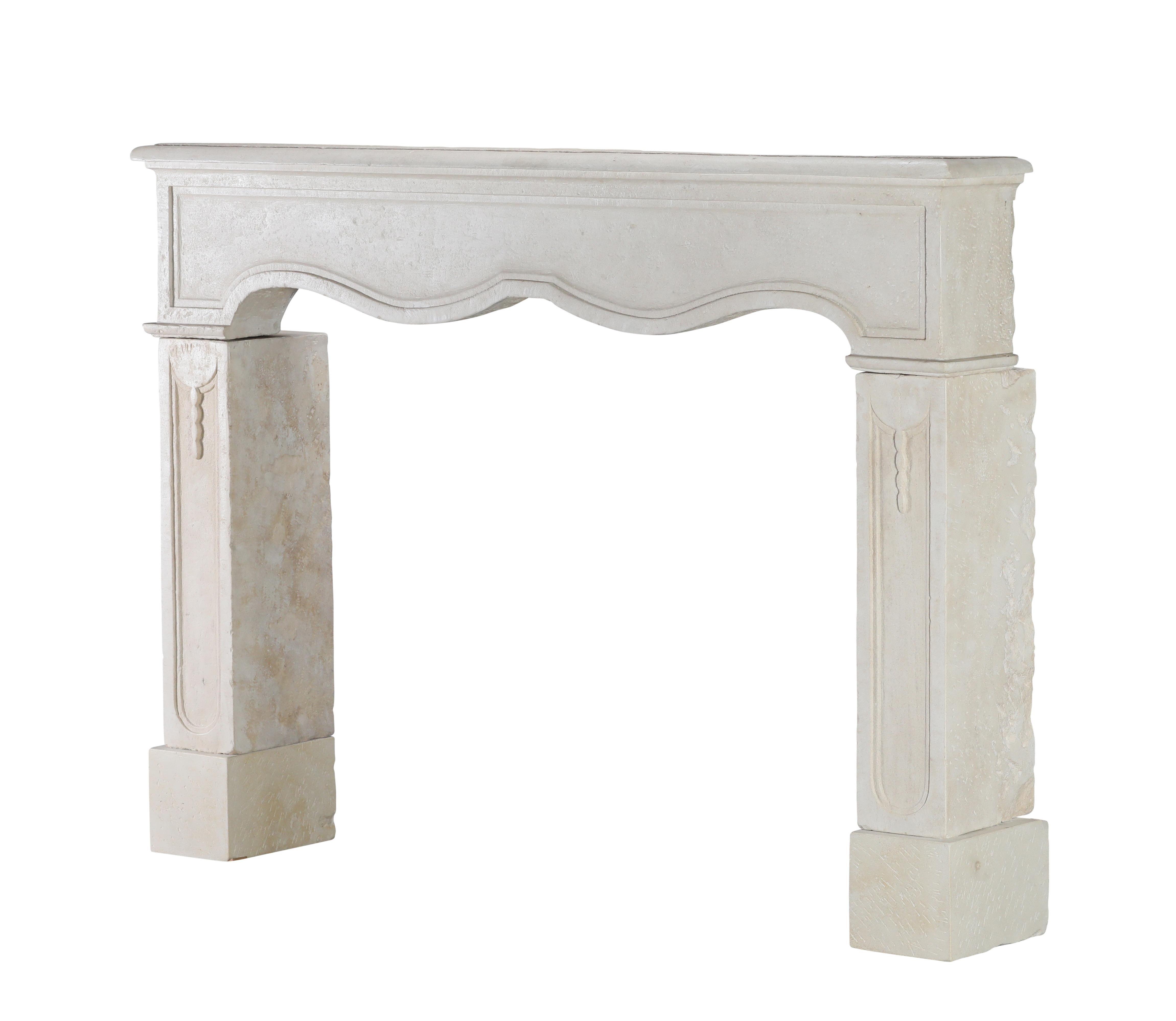 19th Century Reclaimed French Light Stone Fireplace In Timeless Louis XIV Style For Sale
