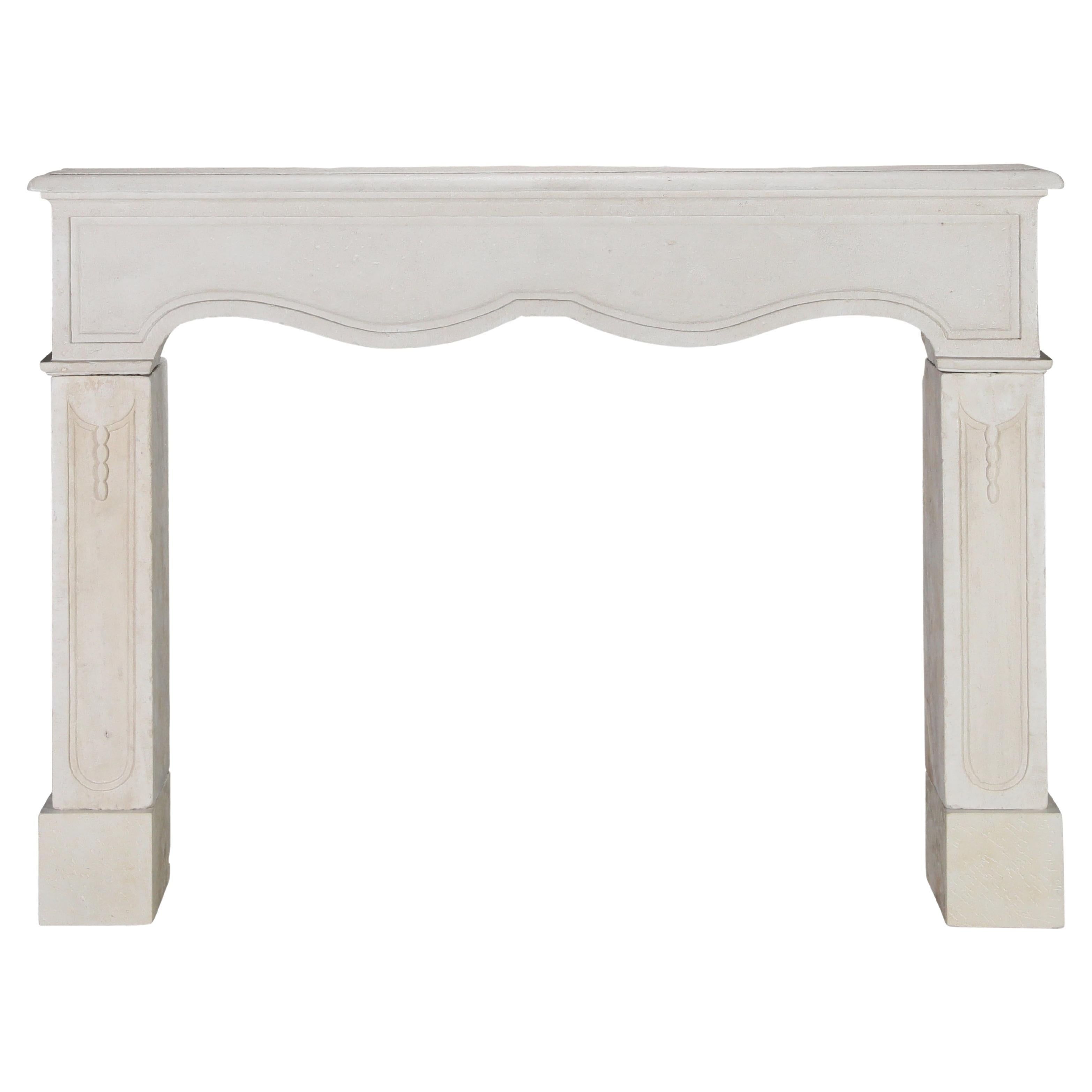 Reclaimed French Light Stone Fireplace In Timeless Louis XIV Style For Sale