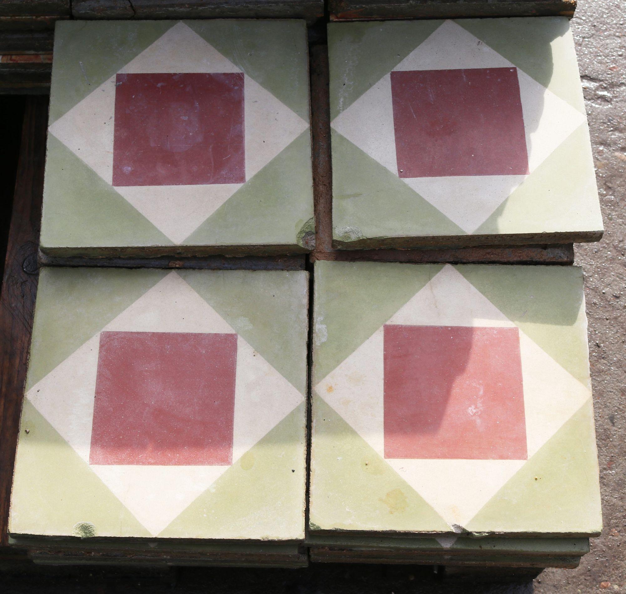 A small batch of 22 reclaimed encaustic cement floor tiles. These tiles will cover 0.88 m2 or 9.4 sq. ft. They are suitable for use on floors or walls.