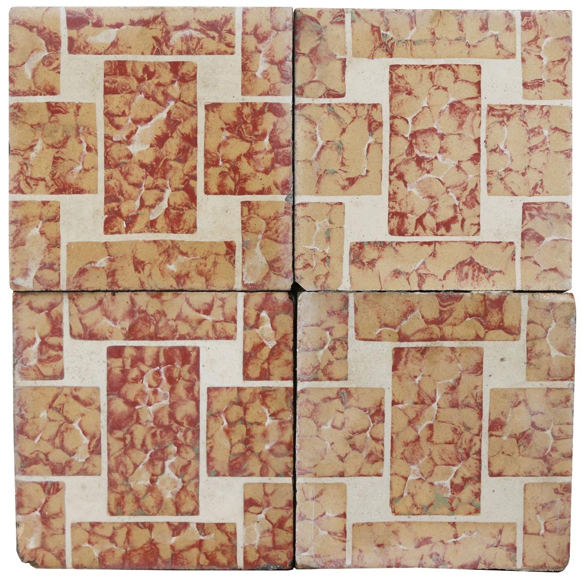 A batch of 190 reclaimed encaustic cement floor tiles. These tiles will cover 7.6 m2 or 81 sq. ft. They are suitable for use on floors or walls.

Weathered surfaces and small chips associated with transport and storage. Good overall condition.