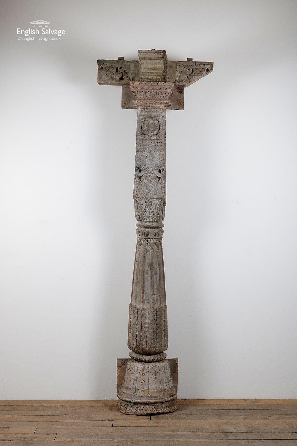 Salvaged Indian hardwood pillar / column with upper support section. Ornately carved with floral and foliate detail throughout. Flat backed to go against a wall. Comes in four sections. Measurements given are the overall. The column section is