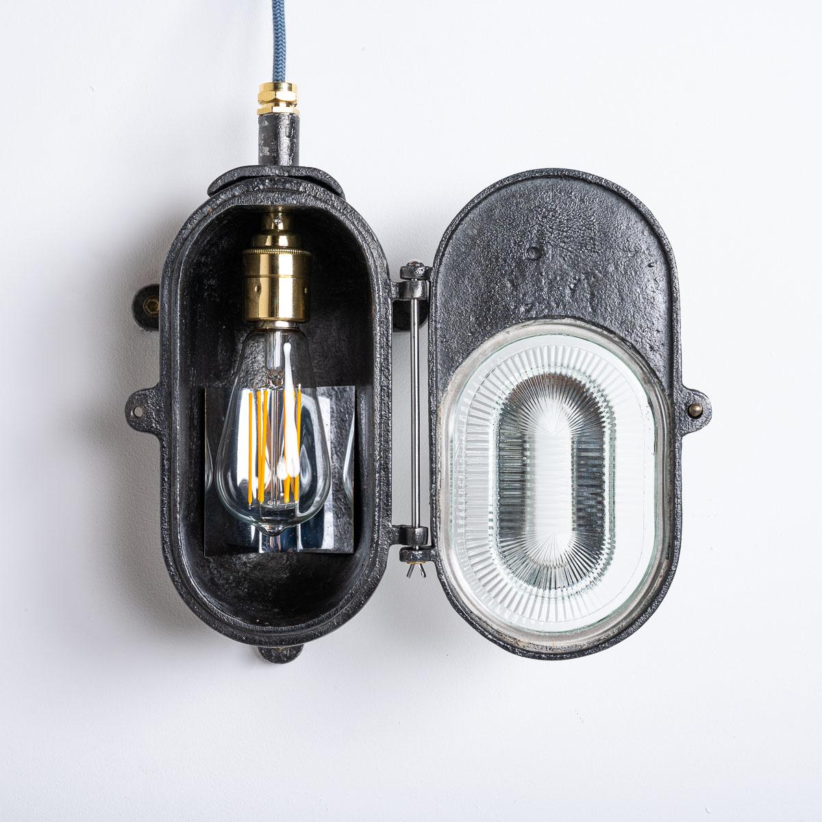 Stunning Heavy Cast Industrial Bulkhead light by Heyes & Co Ltd

A rare oversized heavy industrial bulkhead wall lights manufactured by Heyes & Company of Wigan circa 1950.

Originally installed in the 1950's these extreme wall lights were part of a