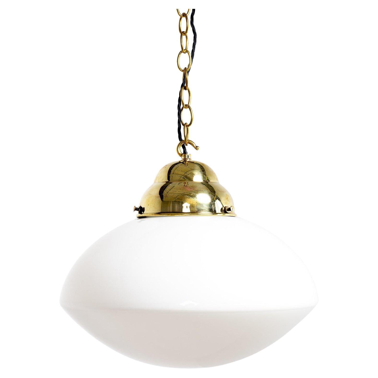 Reclaimed Large Ovaloid Opaline Factory Pendant Lights For Sale