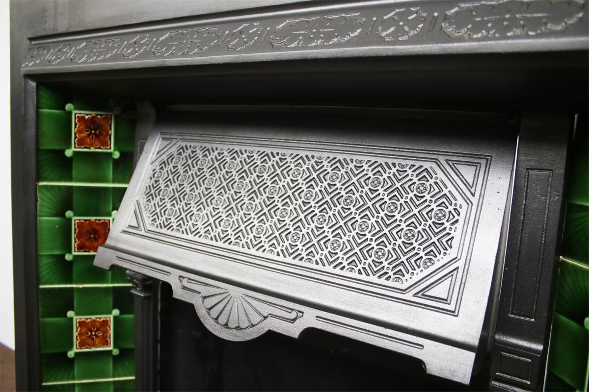 Reclaimed late Victorian cast iron fireplace grate, circa 1895. Complete with a set of original fireplace tiles.


This grate has been finished the traditional black grate polish, leaving a gun metal / pewter shine. Alternative finishes are