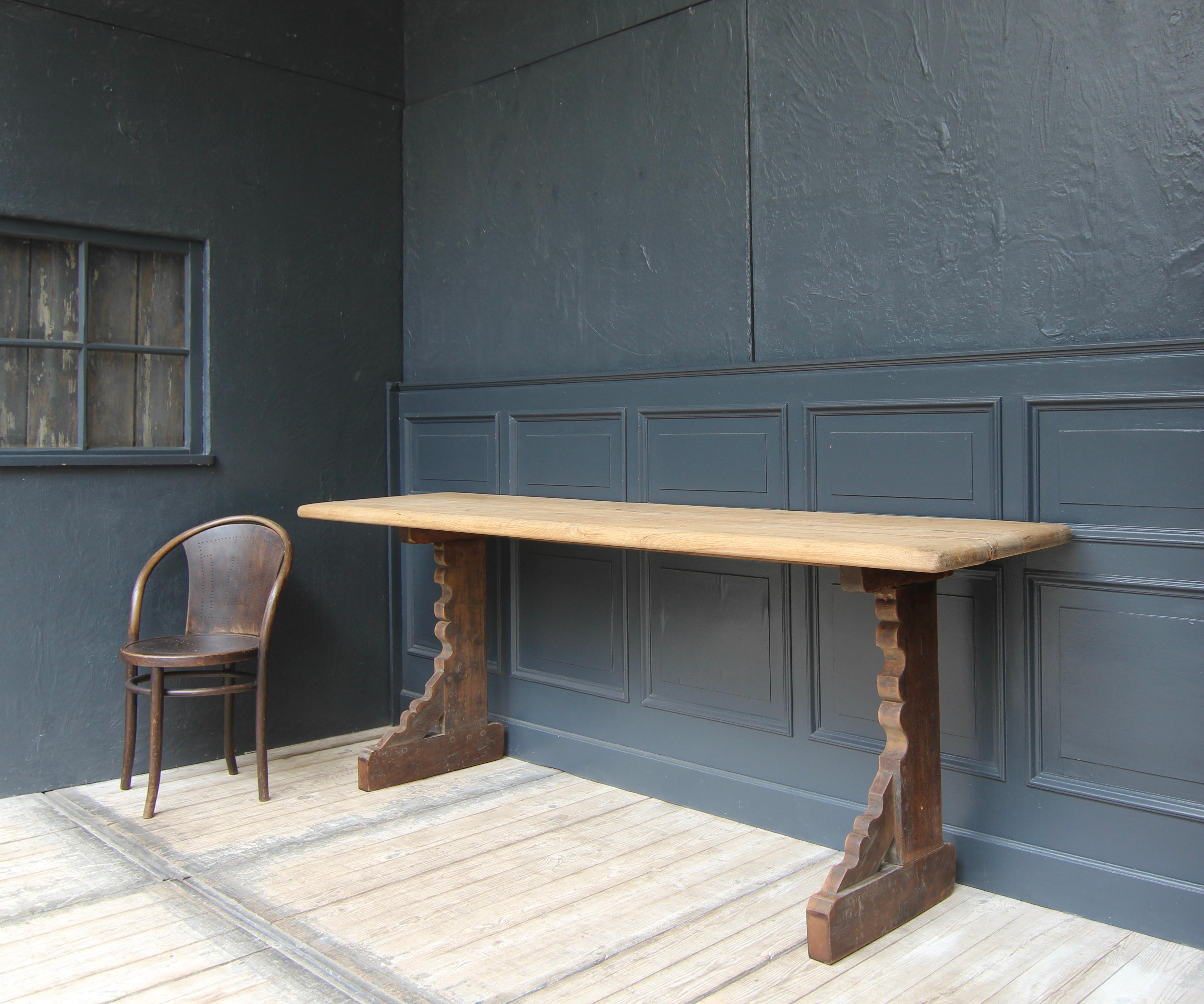 Beautiful console table made from historic oak building materials.

The table legs were originally part of an 18th century loom, while the solid top dates from the early 20th century.

A charming composition of purist design and the contrast between