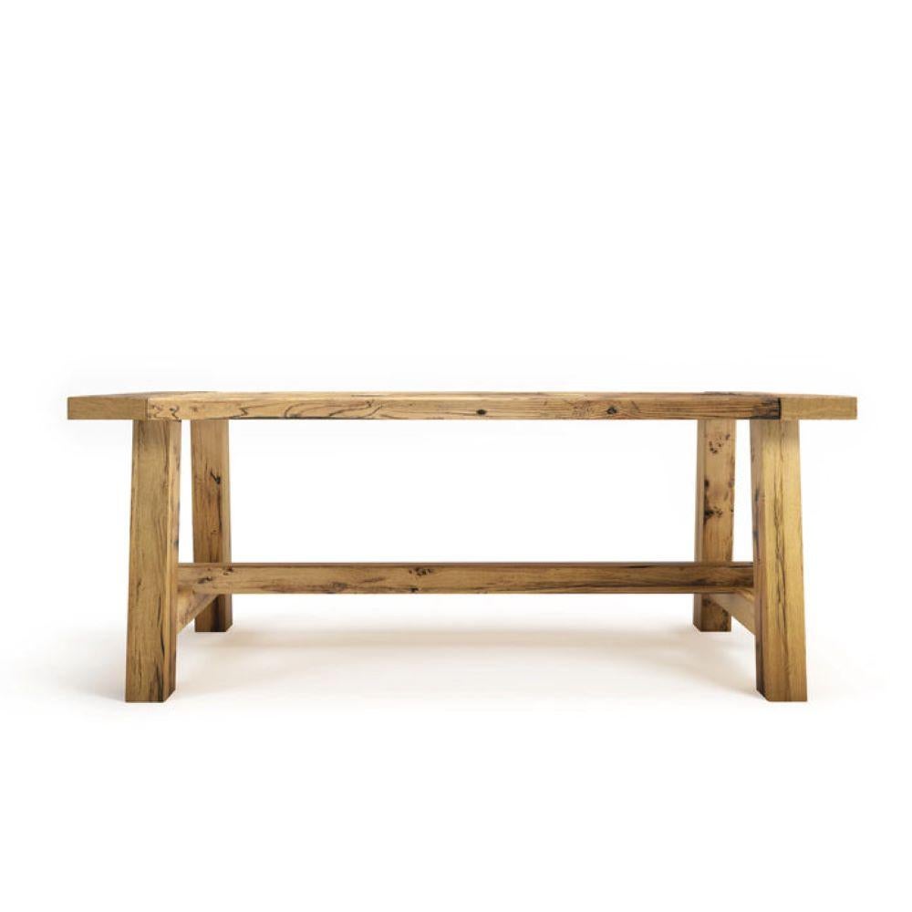 Introducing our exquisite Reclaimed Oak Dining Table, meticulously handcrafted from historic railway sleepers dating back to the 1830s. Each table is skillfully constructed using solid, robust oak wood, ensuring its resilience and everlasting charm