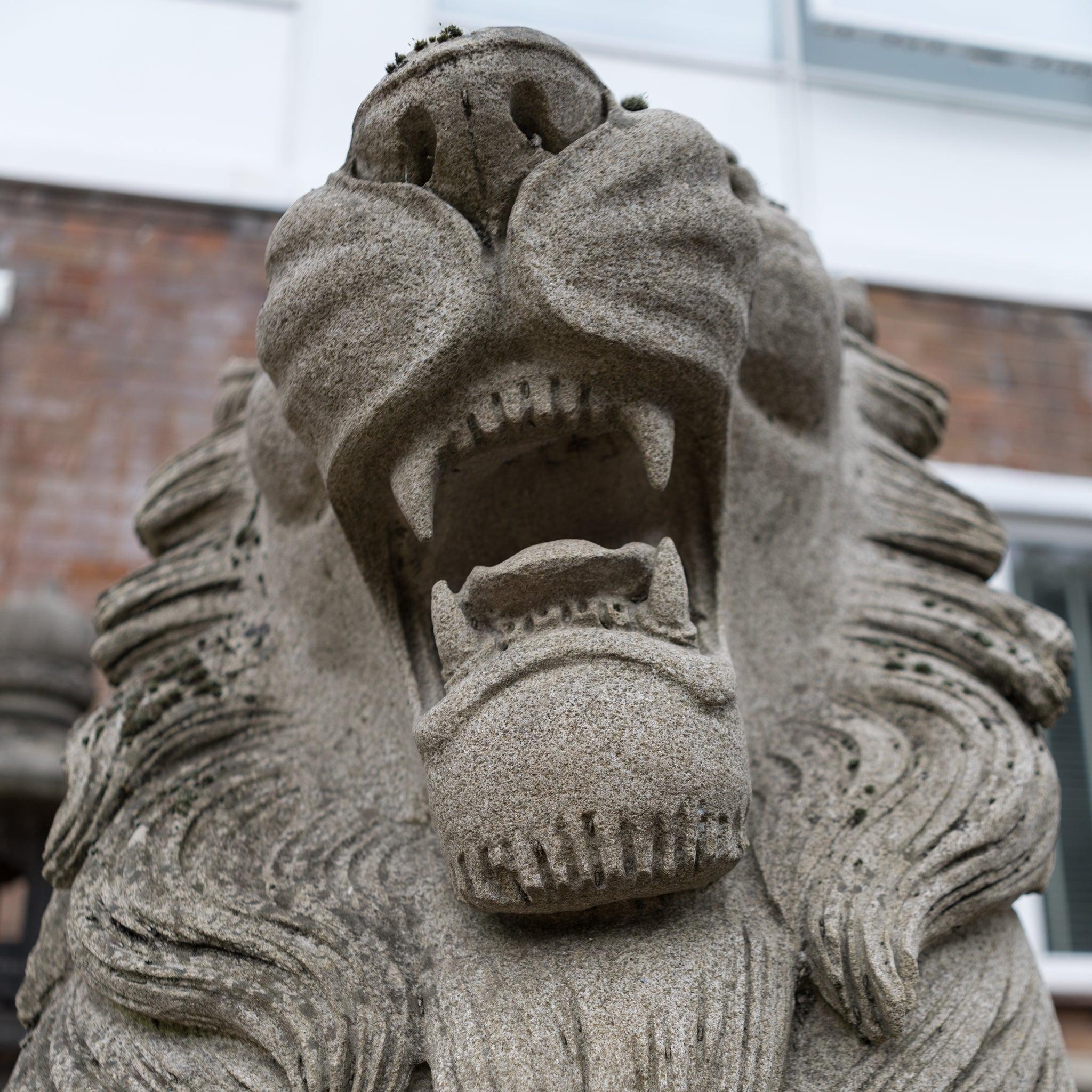 Reclaimed Pair of Monumental Stone Lions on their own Plinth For Sale 3