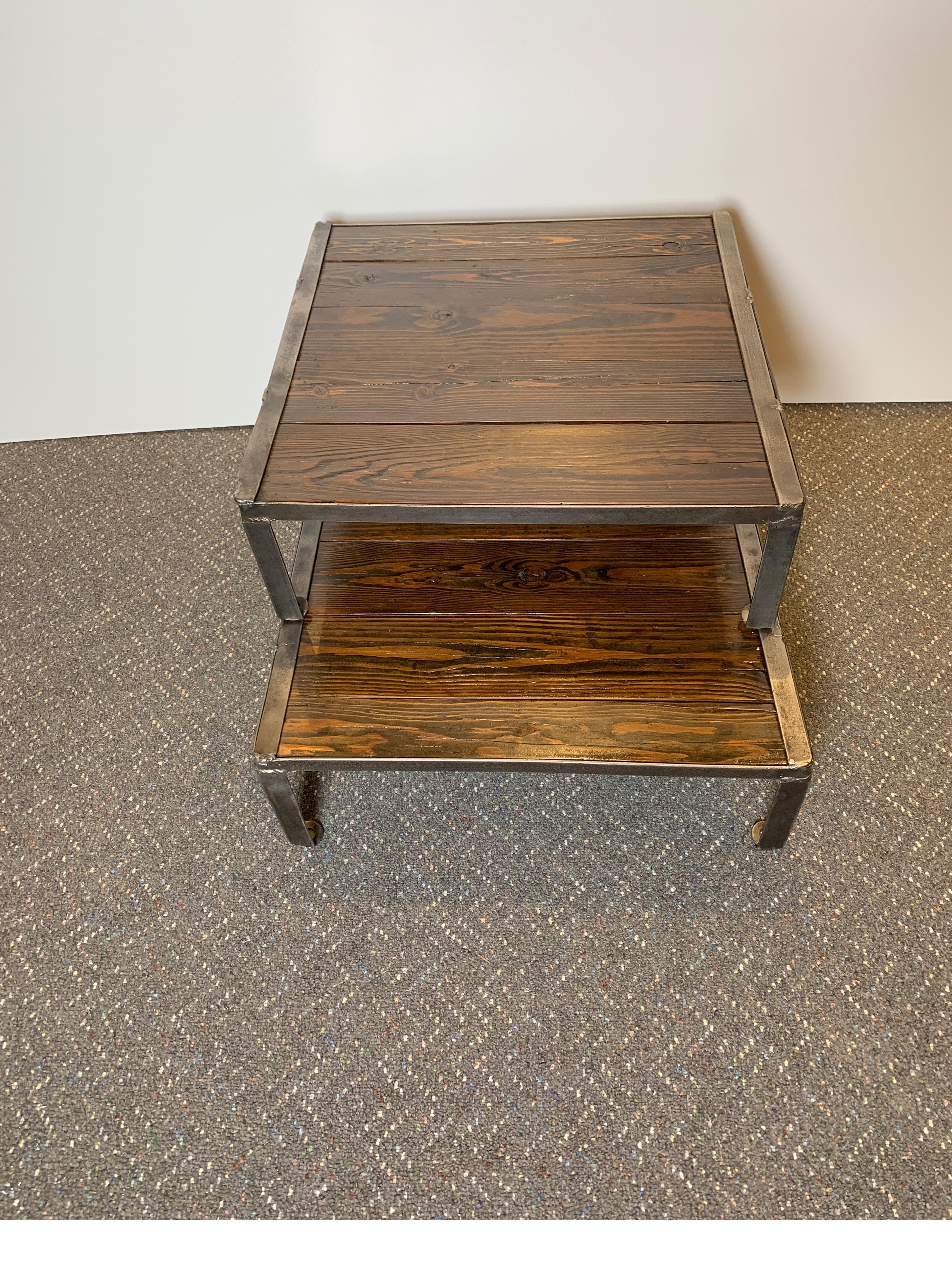 Beautiful stacking and adjustable coffee table made from antique boards. Each table is 23