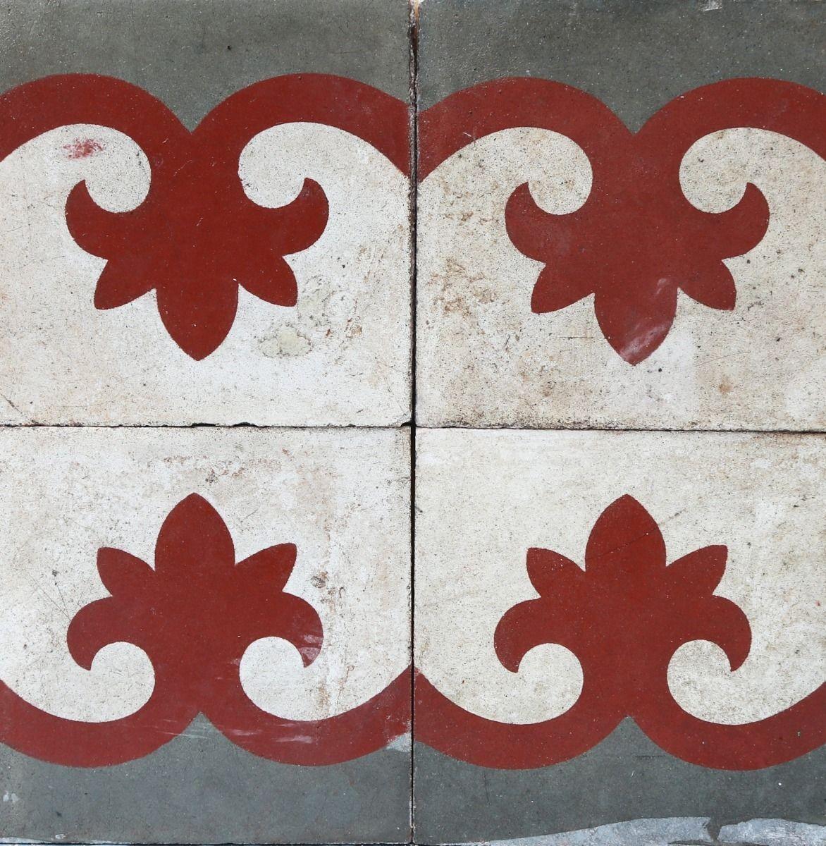 A batch of 28 reclaimed encaustic cement floor tiles. These tiles will cover 1.12 m2 or 12 sq. ft. They are suitable for use on floors or walls.