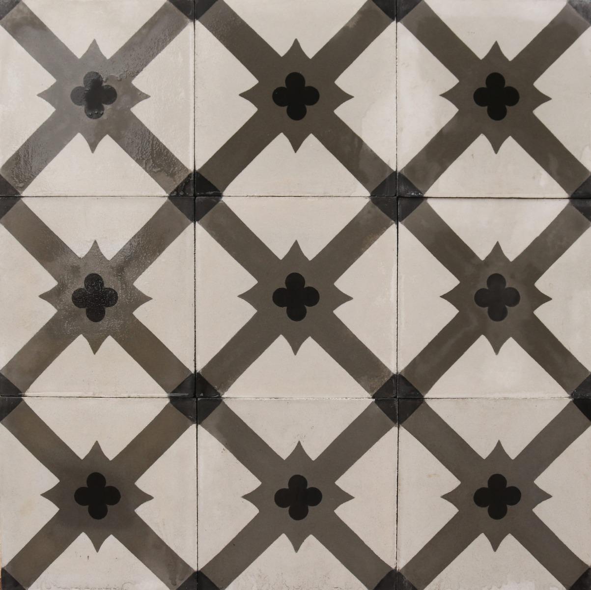 A batch of 86 reclaimed encaustic cement floor or wall tiles. 

These tiles will cover 3.4 m2 or 36 ft2. Weathered surfaces and small chips associated with transport and storage. Unused. Good overall condition. Small chips, losses and surface wear