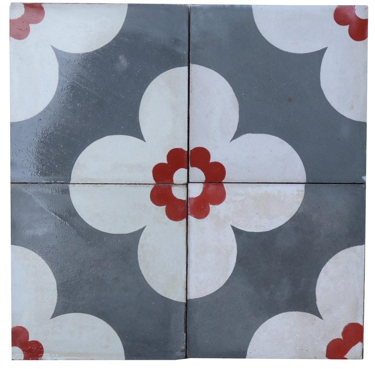 A set of 114 reclaimed encaustic cement tiles. These tiles will cover 4.56 m2 or 49 sq ft.