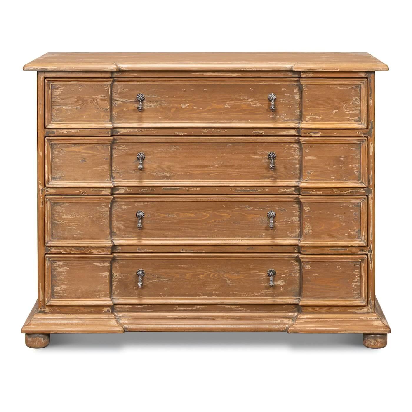 A reclaimed pine commode constructed with tongue and groove joinery. This beautifully crafted piece has a natural aged pine finish with slight white accents. With four serpentine drawers and a natural aged pine interior. 

Dimensions: 47