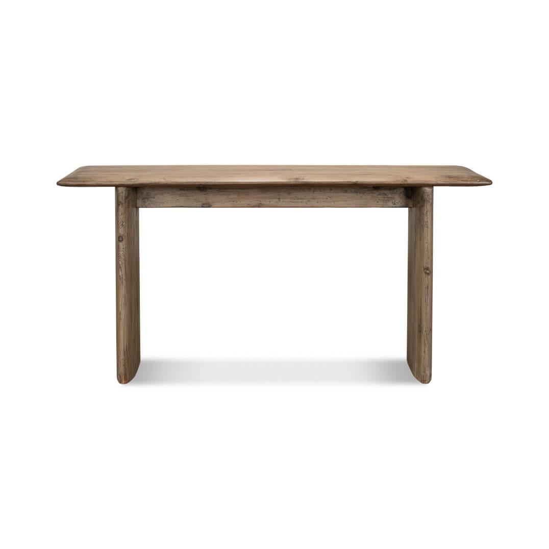 This table offers a harmonious blend of simplicity and warmth. Its natural wood surface of reclaimed pine, with a rich grain that tells its unique story, serves as a centerpiece for your dining room with a modern edge. The minimalist silhouette,