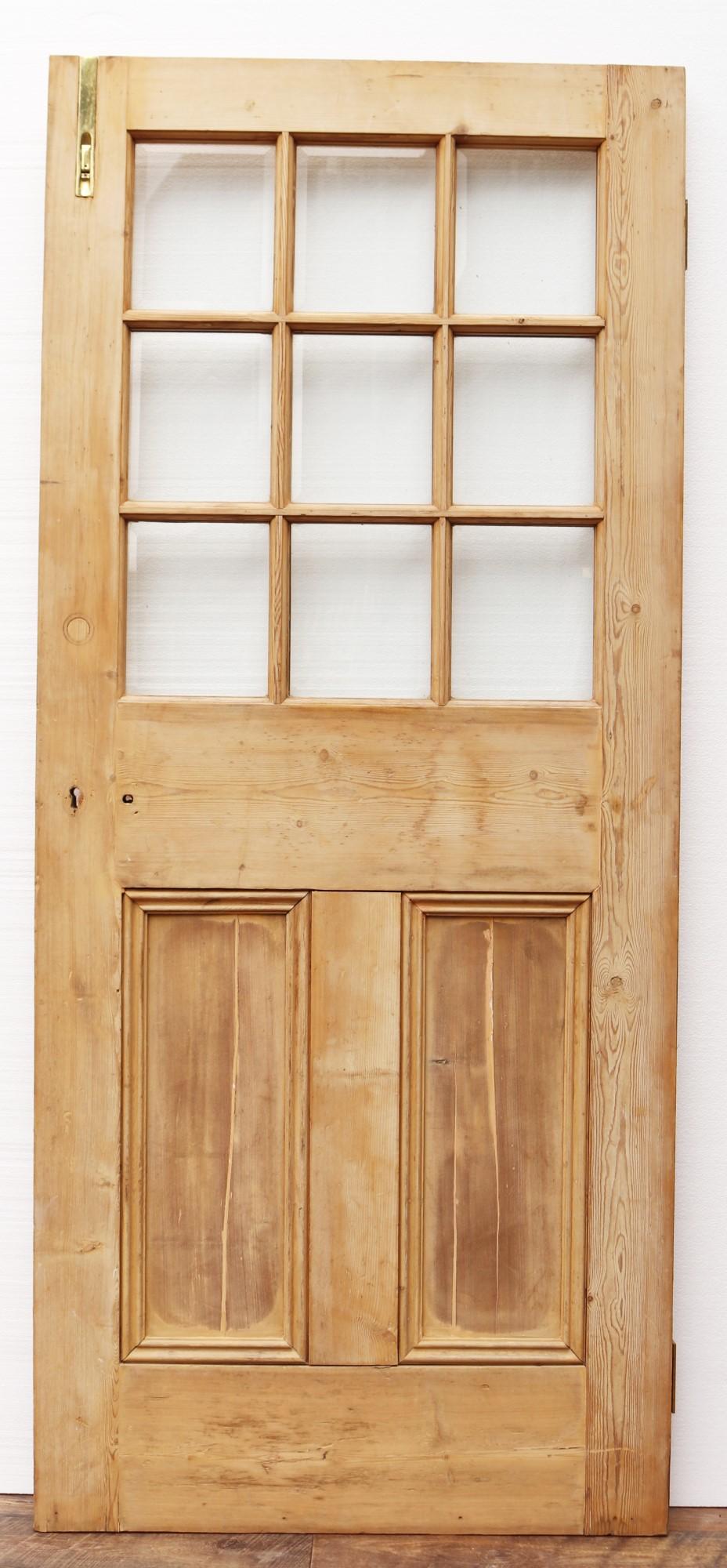 A glazed pine door with a stripped and sanded finish. The glazing is complete and consists of bevelled glass.
 
Suitable for interior or exterior use.