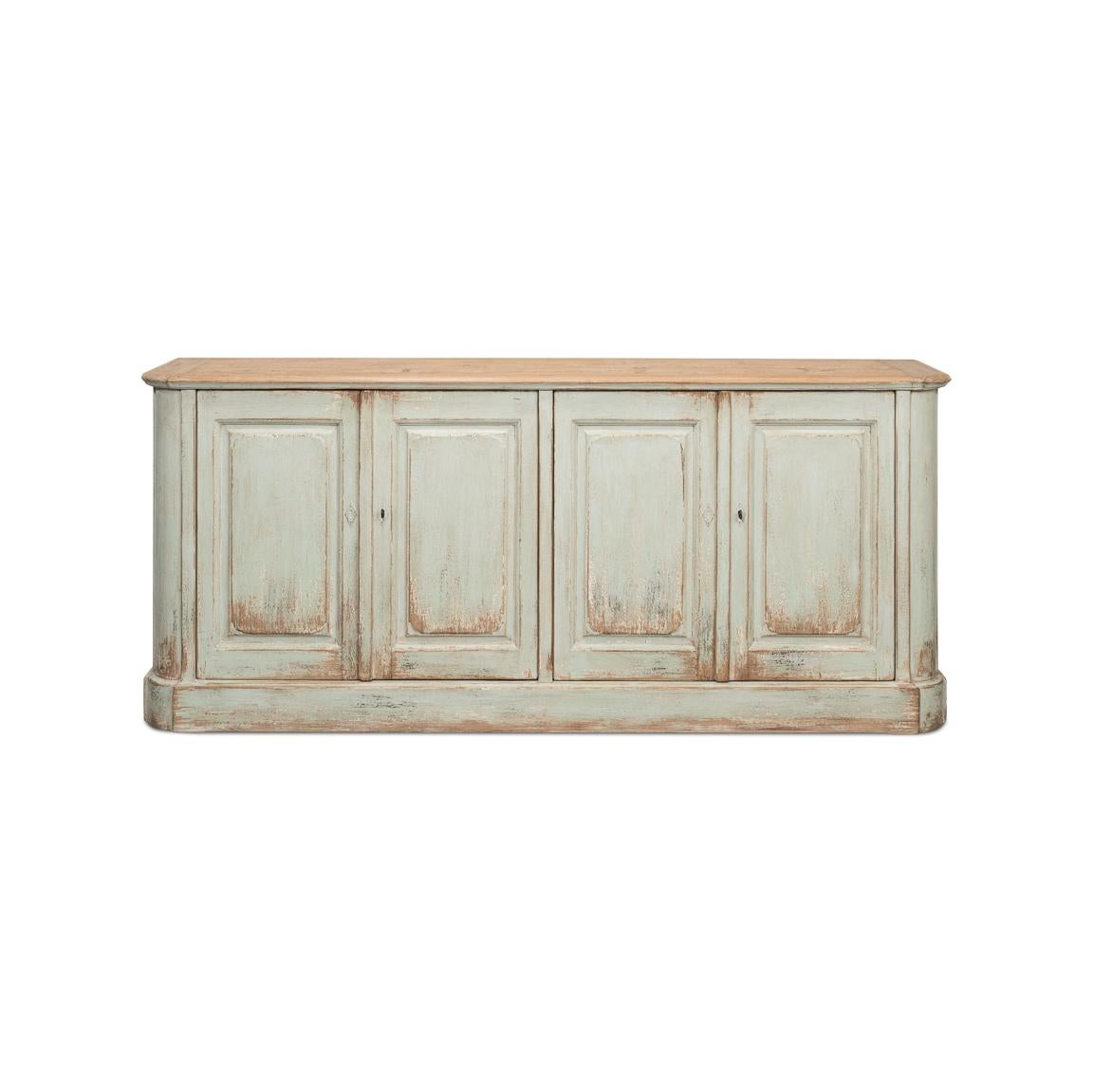 Beautifully finished in a serene sage painted finish. Perfect for those who appreciate the allure of rustic yet refined design, this sideboard marries functionality with a heartfelt nod to the natural world.

At 83 inches wide, 20 inches deep, and