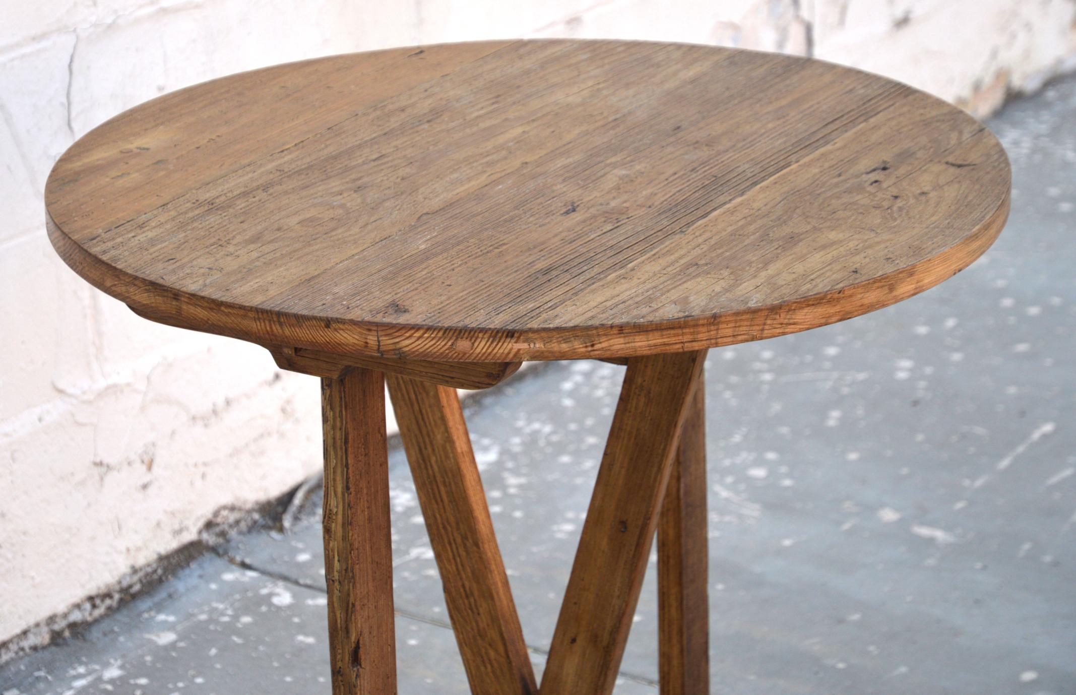 This gate leg table is made from reclaimed pine and has a tilt top which rotates vertically 90 degrees (see pictures 5 - 8). This table is seen here in a 30