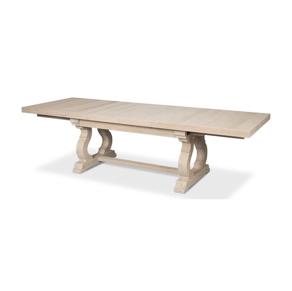 Crafted from reclaimed pine, its distressed grey and whitewash finish highlights the natural grain and texture of the wood, delivering a relaxed and weathered farmhouse appeal.

Designed with a sturdy trestle base, this rectangular table is perfect