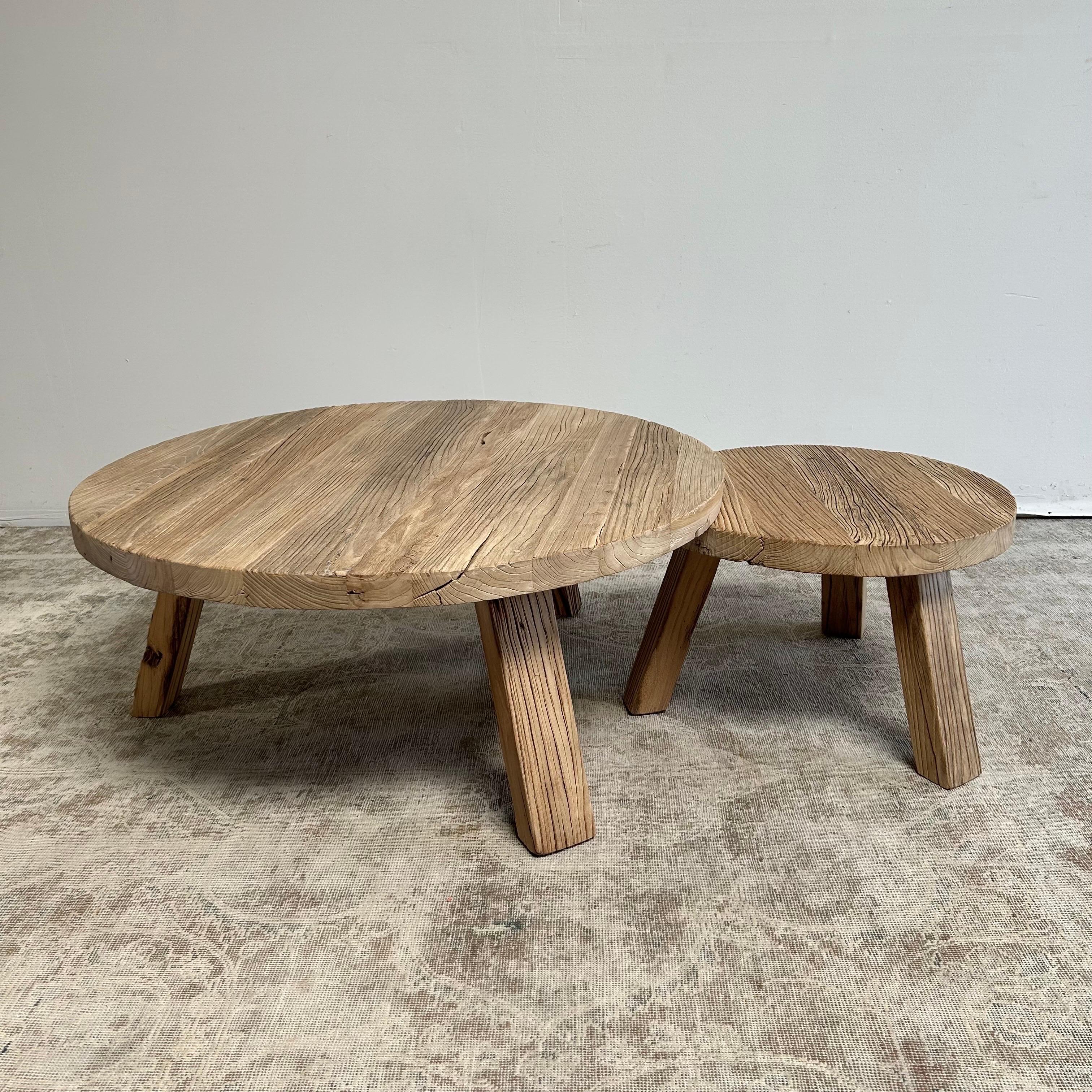 Reclaimed round Elm wood coffee table set.
Set of 2 elm wood coffee tables, 
Sizes: 42”rd. X 18”H 
Sizes: 24”rd. X 15-1/2”H
The smaller one will slide under the larger round to create a multi level set.
Also sold individually in separate