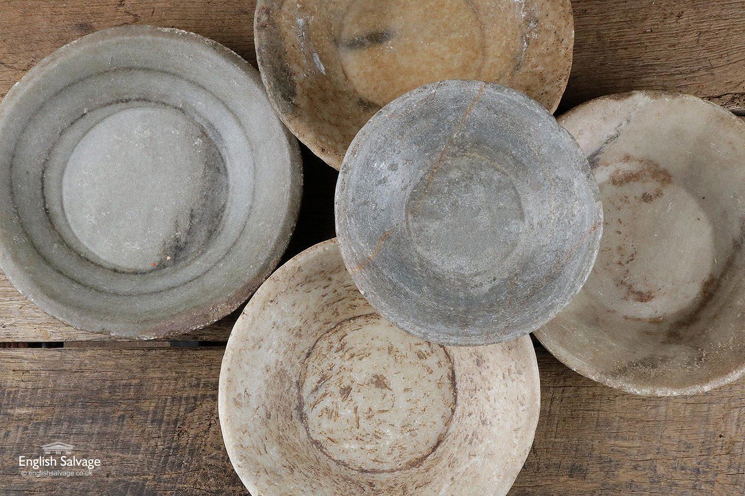 Reclaimed marble bowls, in shades of grey and beige marble. No two are the same due to natural colour and texture variations in the old stone. Small 22cm / Medium 24cm diameter and Large 27cm. Small dings and chips to edges.