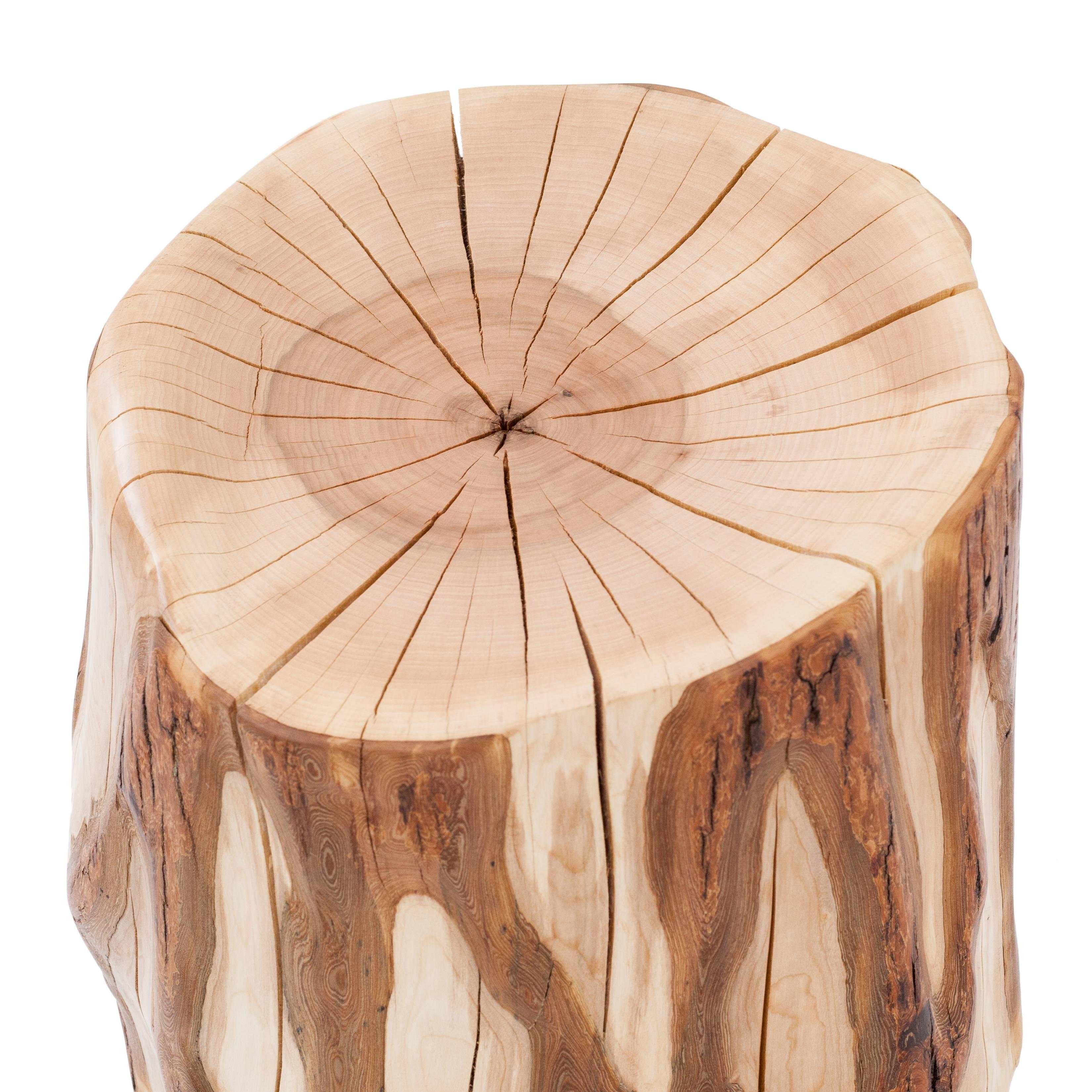 A sugar maple that fell during Hurricane Sandy was rescued and repurposed. Sections of the tree were cut with a chainsaw and allowed to dry out. Each piece is then uniquely shaped with or without a design and has a scooped out seat for comfort. Each