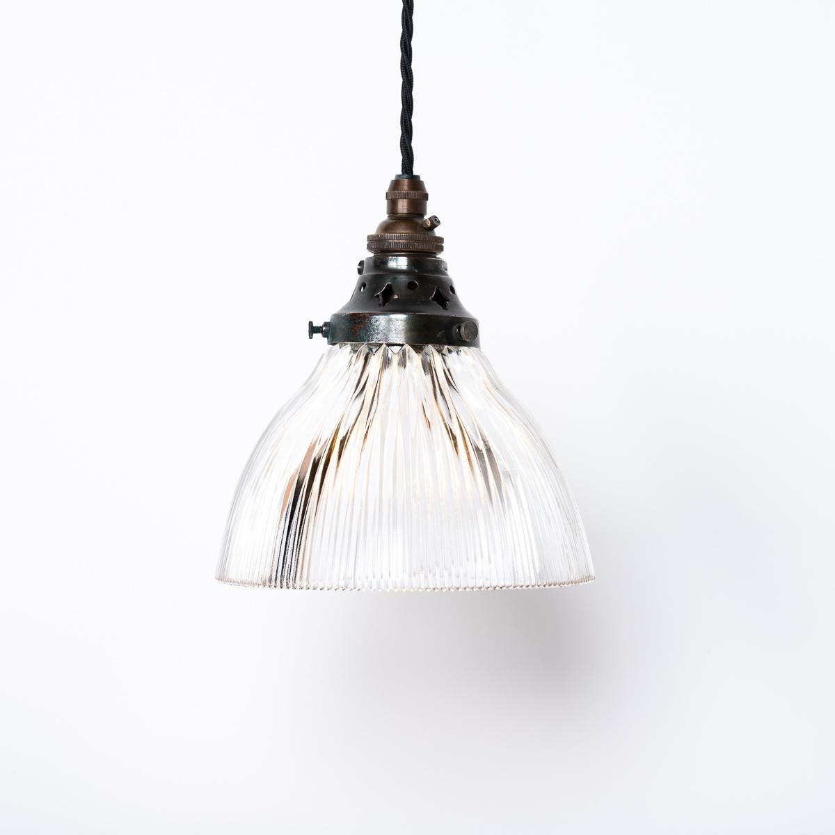 ANTIQUE SMALL HOLOPHANE PRISMATIC GLASS PENDANT LIGHTS
PRICE IS PER LIGHT

An attractive run of small antique Holophane prismatic glass light with original aged brass fittings.

Stamped Holophane galleries and rare blue prismatic glass shades also