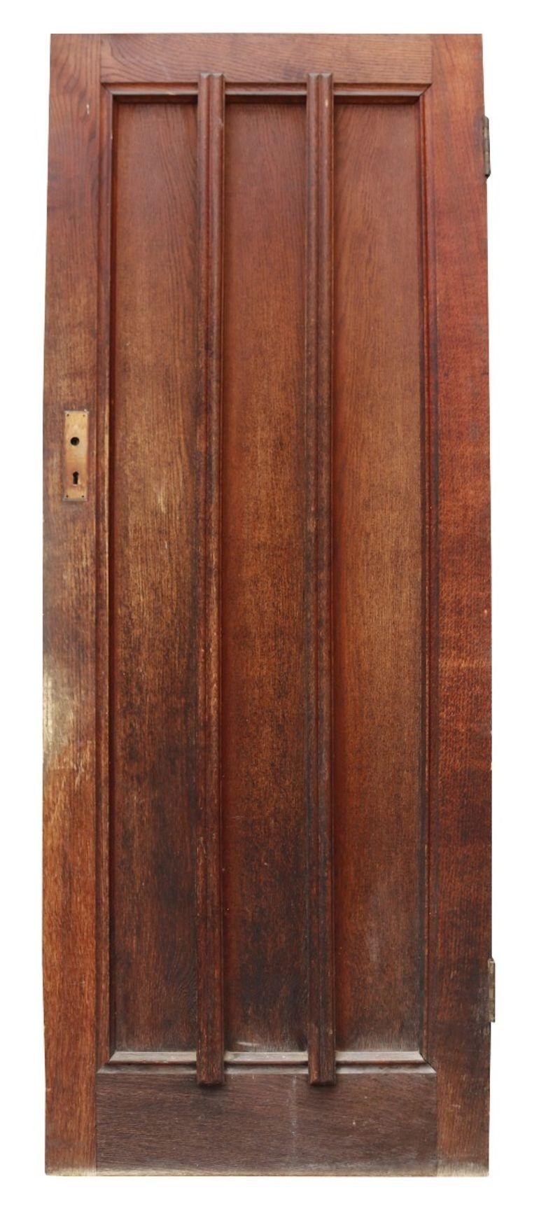 A reclaimed 1930s oak door. Suitable for use as a front door.