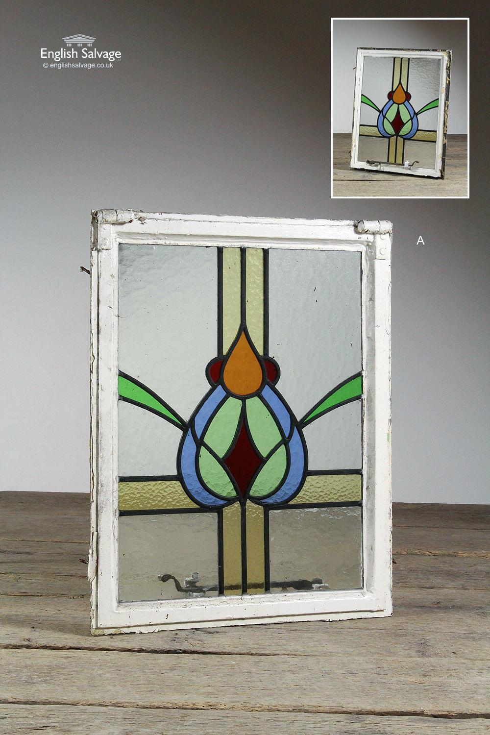 Stained glass and leaded metal framed windows, with opening latches. The clear glass sections are slightly obscured/textured, coloured glass is smooth. Each window is 50.5-51cm wide on the outside edge, 48.5cm on the inside edge x 63cm high on the
