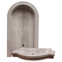 Fuente de pared de piedra recuperada