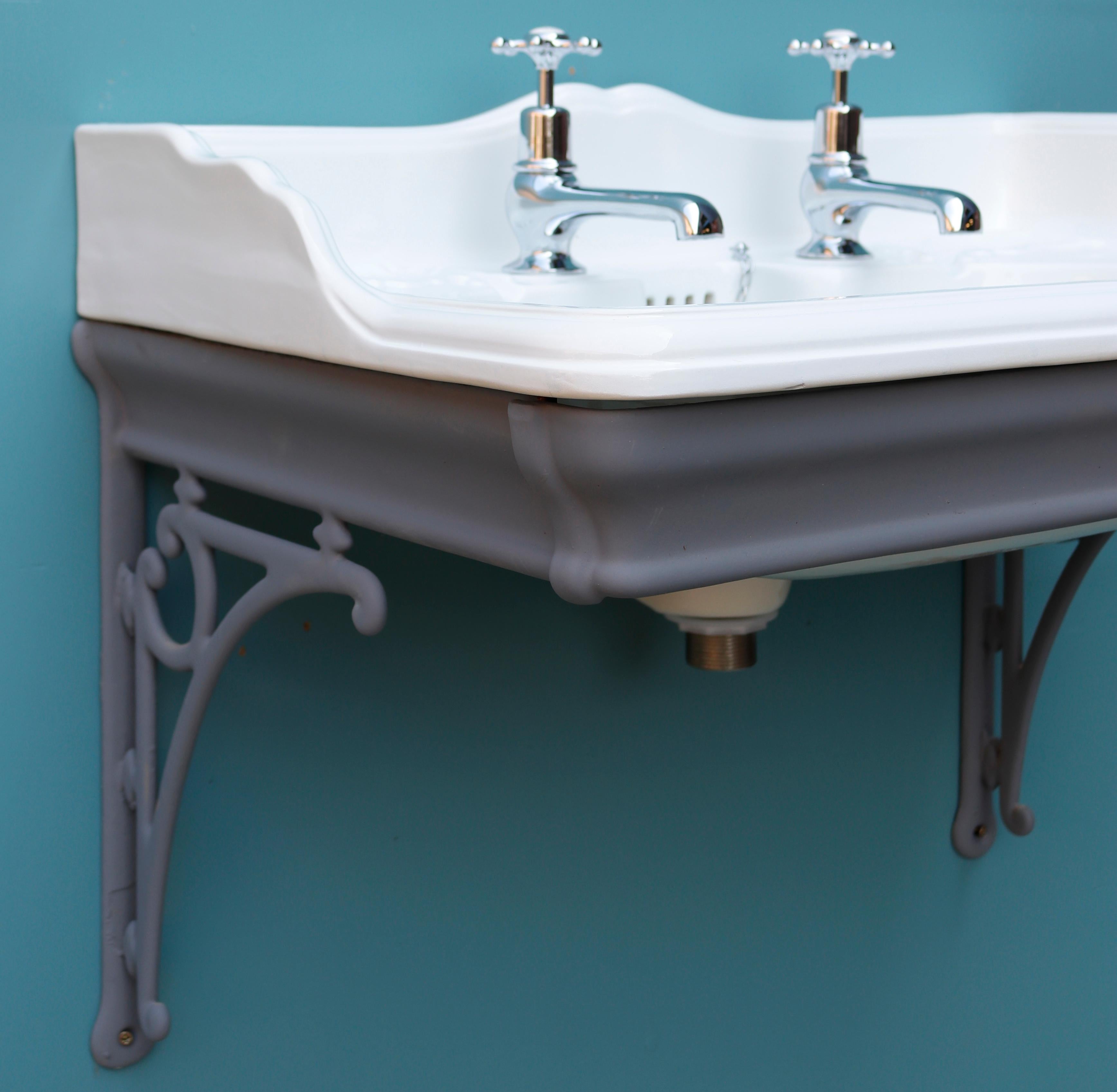 Reclaimed Victorian Sink Basin dating to around 1900. Complete with a cast iron bracket painted in grey primer. Please note the taps are not included.