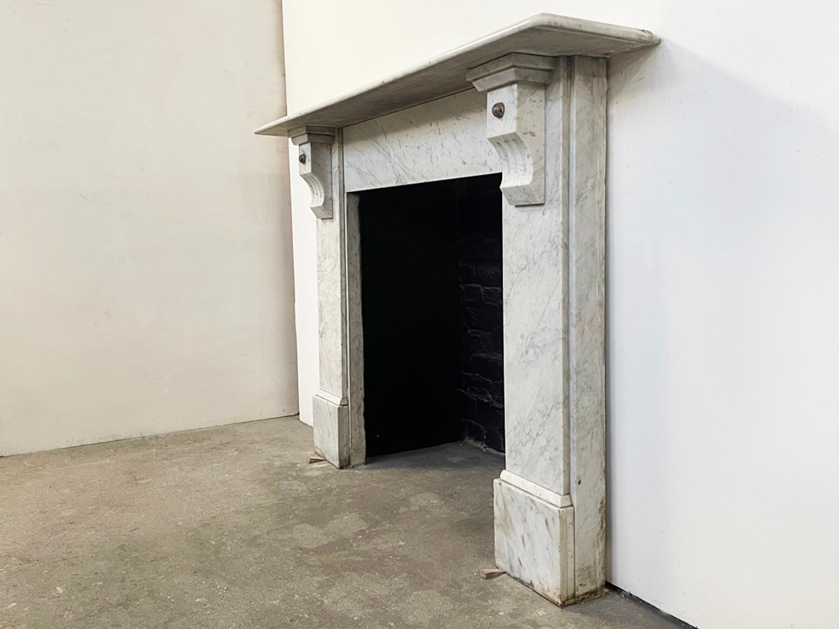 Reclaimed Victorian Corbelled Carrara Marble Fireplace Surround In Good Condition For Sale In Manchester, GB