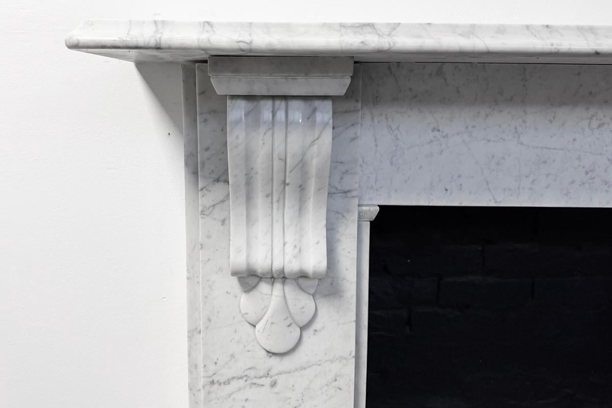 Reclaimed Victorian Corbelled Carrara marble fireplace surround In Good Condition For Sale In Manchester, GB