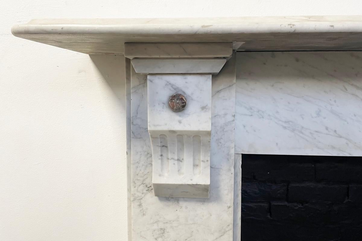 19th Century Reclaimed Victorian Corbelled Carrara Marble Fireplace Surround For Sale