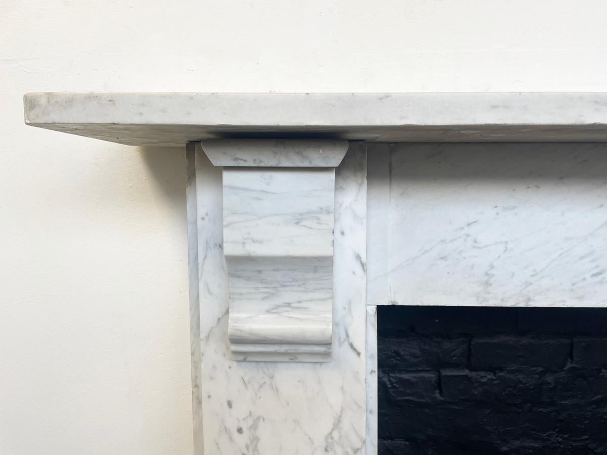 19th Century Reclaimed Victorian Corbelled Carrara Marble Fireplace Surround