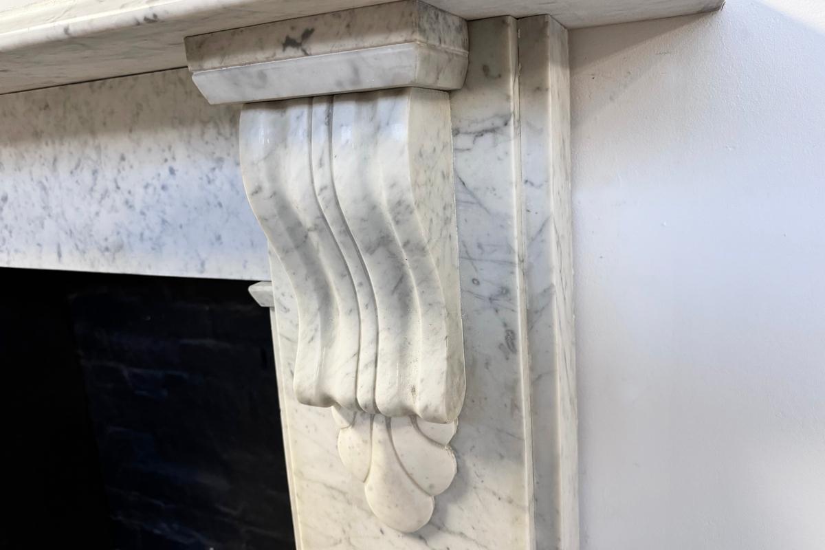 Carrara Marble Reclaimed Victorian Corbelled Carrara marble fireplace surround For Sale